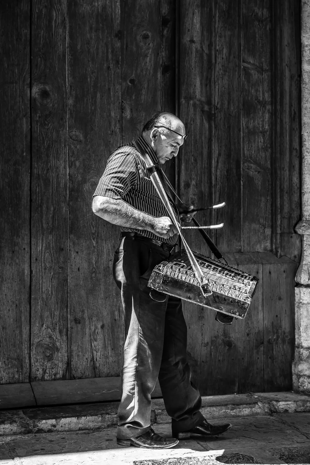 Street Musician in Shadow